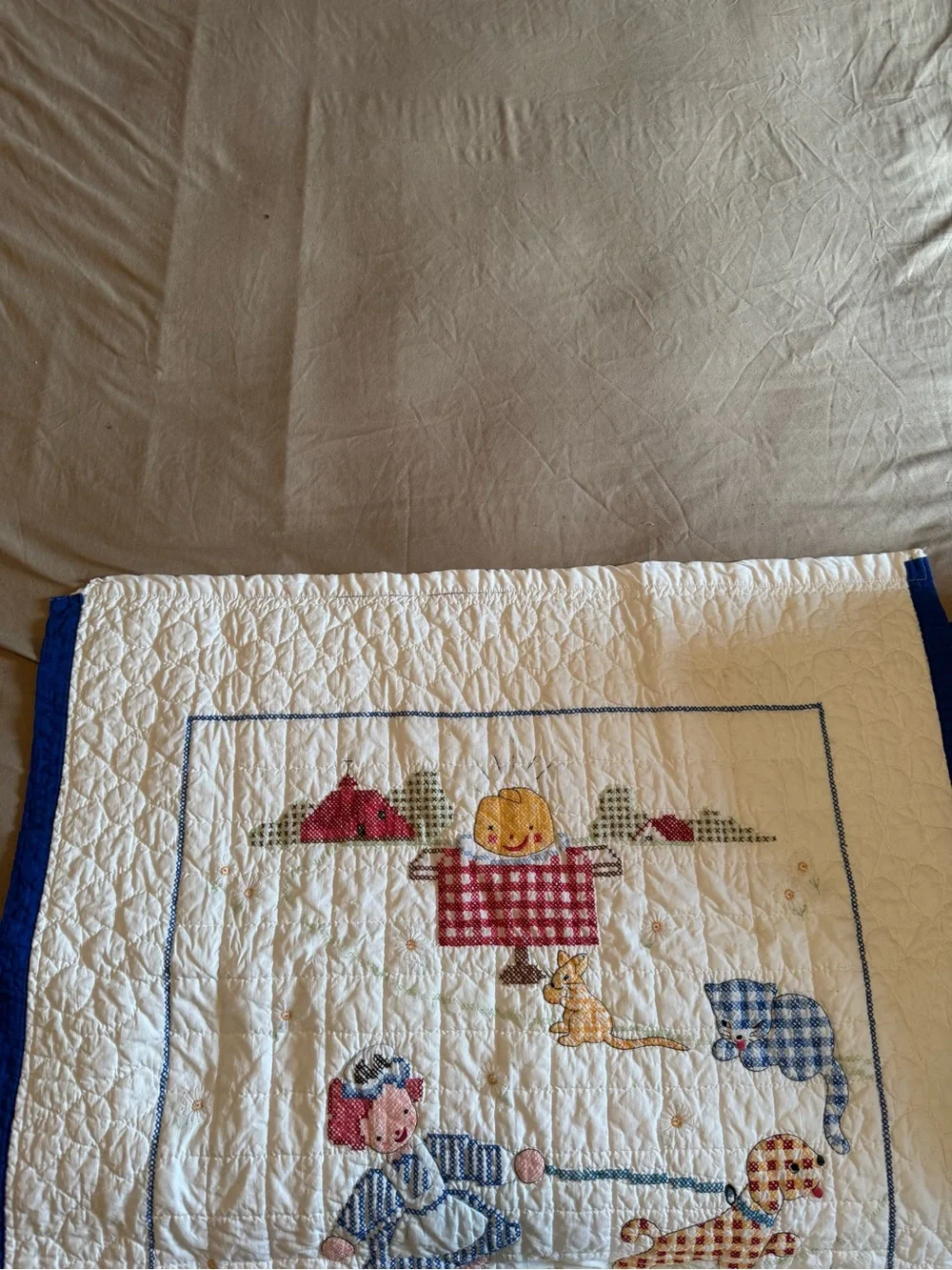 Vintage embroidered kids quilt